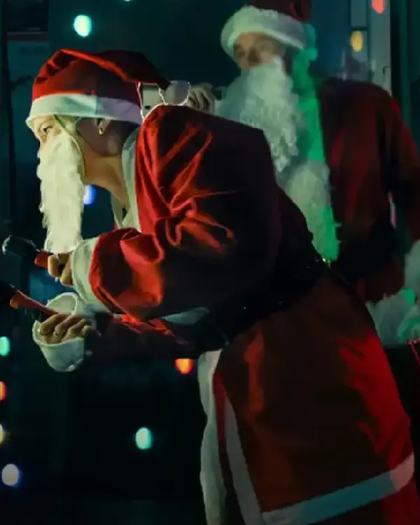 Jingle Bell Heist Olivia Holt Santa on Coat