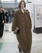 Shop Lily Collins Austerlitz Train Station Oversized Cotton Brown
