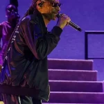 Shop Now Coachella Snoop Dogg 2026 Valley Music and Arts Festival Look Black Satin Bomber Jacket For Sale